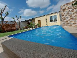 Bazén v ubytování Mare S&M Casa Hostal nebo v jeho okolí