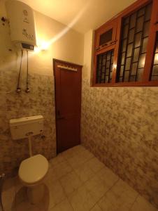 Koupelna v ubytování TSUKIMI Homestay, Naggar, Manali