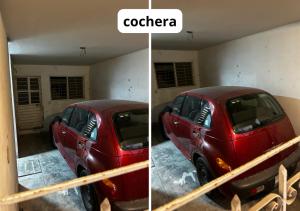 un coche rojo está aparcado en un garaje en Departamento acogedor, Diseño optimizado, en Tuxtla Gutiérrez