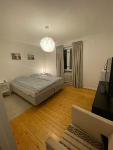 Кровать или кровати в номере Casa 716 - Villa nära golf & natur