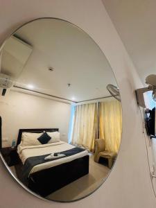 Katil atau katil-katil dalam bilik di Wildwings hotel