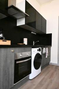 Η κουζίνα ή μικρή κουζίνα στο Charmant petit pont Ardennais/cosy/T1/wifi/parking