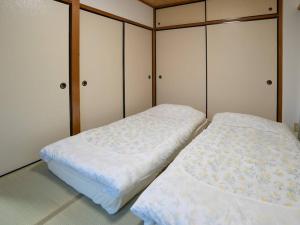 Cama o camas de una habitación en 402号室貸切！2DK/京成佐倉駅徒歩3分・電車成田空港20分/2部屋/厨房/風呂/畳/家具綺麗！