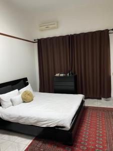 A bed or beds in a room at MozBnb