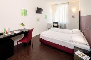 Ένα ή περισσότερα κρεβάτια σε δωμάτιο στο Hotel Rio Muralto
