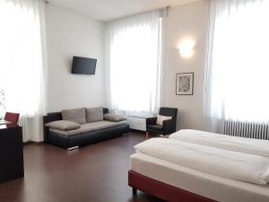 Ένα ή περισσότερα κρεβάτια σε δωμάτιο στο Hotel Rio Muralto