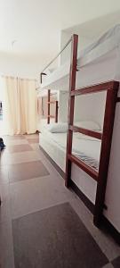 Postel nebo postele na pokoji v ubytování Camotes Hostel Resort