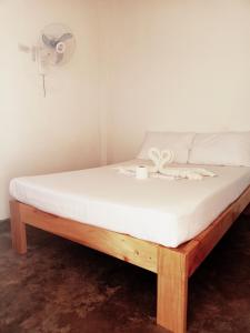 Postel nebo postele na pokoji v ubytování Camotes Hostel Resort