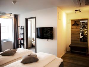 Postel nebo postele na pokoji v ubytování Hotel KUMP365
