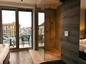 Postel nebo postele na pokoji v ubytování Hotel KUMP365