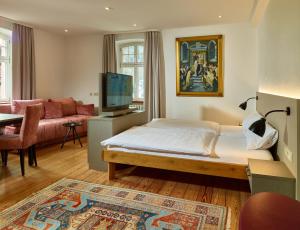 TV a/nebo společenská místnost v ubytování Hotel & Restaurant Burgschänke
