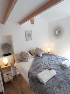 Postel nebo postele na pokoji v ubytování Les randonnées joyeuses