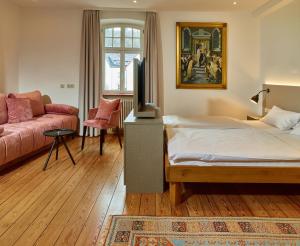 Postel nebo postele na pokoji v ubytování Hotel & Restaurant Burgschänke