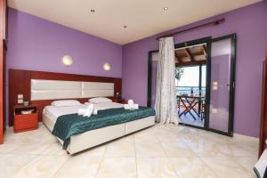 Postel nebo postele na pokoji v ubytování Kerkyra Beach Hotel & Apartments