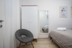 Postel nebo postele na pokoji v ubytování Elegant apartment next to Arena