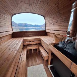 an empty cabin with a window in a boat at Troll Fjordhytter in Syvde