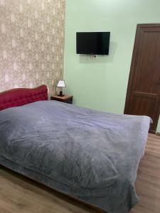 Letto o letti in una camera di Guest House Ok