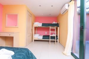 Postel nebo postele na pokoji v ubytování Corfu Hotel Apartments