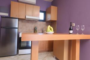Kuchyň nebo kuchyňský kout v ubytování Corfu Hotel Apartments