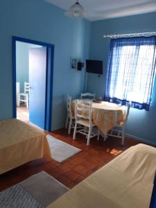 Postel nebo postele na pokoji v ubytování Blue Garden