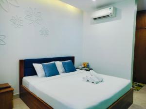 Postel nebo postele na pokoji v ubytování Adventure Hotel