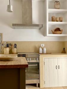 A kitchen or kitchenette at Trullo Falco