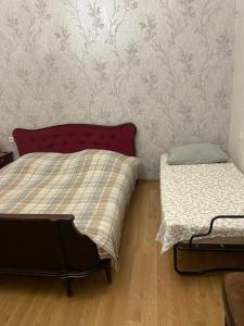 Letto o letti in una camera di Guest House Ok