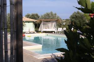 Bazén v ubytování Agriturismo Agrimaccari Marzamemi-Vendicari - Esperienza autentica siciliana nebo v jeho okolí