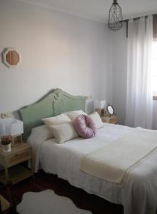 Кровать или кровати в номере Estrela de mar