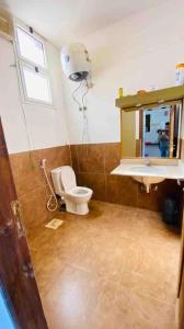 a bathroom with a toilet and a sink at Lighthouse studio in Dahab +14 photos