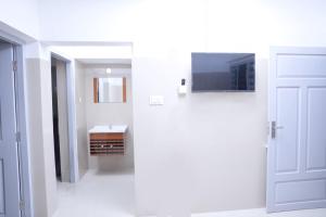 TV a/nebo společenská místnost v ubytování Asian Nest Serviced Apartments