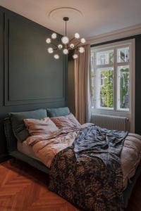 Кровать или кровати в номере Viennese jewel I 120 m² I Quiet area