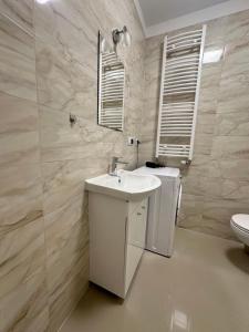 Koupelna v ubytování Apartament ŻELAZNY HGS Home