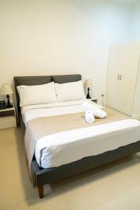 Postel nebo postele na pokoji v ubytování Bavarian Guest House