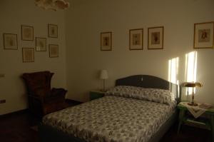 Postel nebo postele na pokoji v ubytování La casa di Beppe