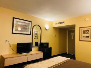 TV a/nebo společenská místnost v ubytování M Star Hotel Mansfield + 34 fotografií