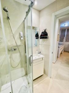 a bathroom with a shower and a sink at MADRID CENTRO in Madrid