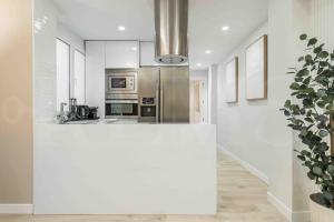 Η κουζίνα ή μικρή κουζίνα στο Elegant apartment in historic center by REMS