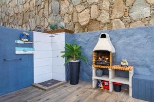 Billede fra billedgalleriet på Casa BOSS Modern Villa with Studio Pool and Air Conditioning i Puerto Rico de Gran Canaria