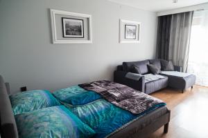 Кровать или кровати в номере Apartament Rynek 10