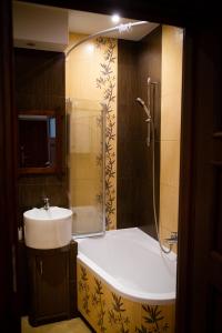 Ванная комната в Apartament Rynek 10