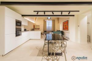 Kuchyňa alebo kuchynka v ubytovaní Zema Home by Apulia Accommodation + 37 fotografií