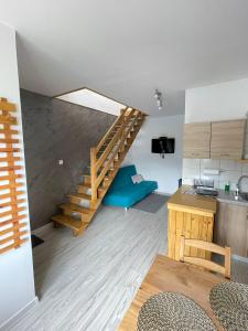 Kuchyň nebo kuchyňský kout v ubytování Apartamenty Młynne