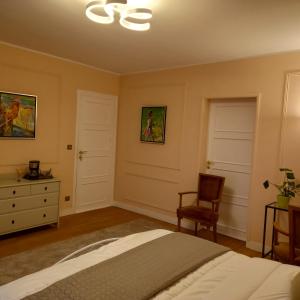 Ένα ή περισσότερα κρεβάτια σε δωμάτιο στο Molibeau