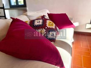 A bed or beds in a room at Villetta Ciro, 3 camere, giardino e parcheggio, a soli 50 m dal mare! by Alfareal