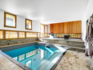 a swimming pool in a house at Chalet Morzine, 9 pièces, 14 personnes - FR-1-627-9 in Morzine