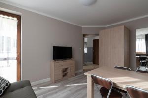 TV at/o entertainment center sa Jaśmin - Tęczowe Wzgórze