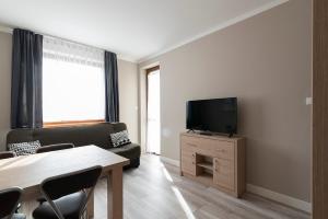 TV at/o entertainment center sa Jaśmin - Tęczowe Wzgórze