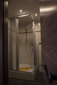 Ванная комната в Hotel Weinhaus Kreuter