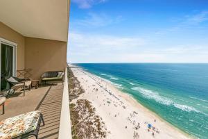 a view of the beach from the balcony of a condo at Grandview East 1503 in Panama City Beach